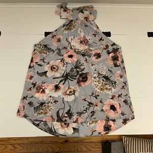 Grey peach and white Floral halter top with bow closure. Size Large